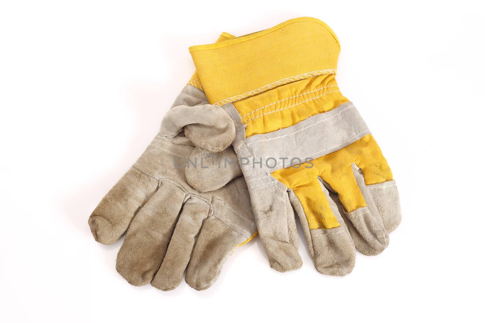 Works yellow protective gloves on white