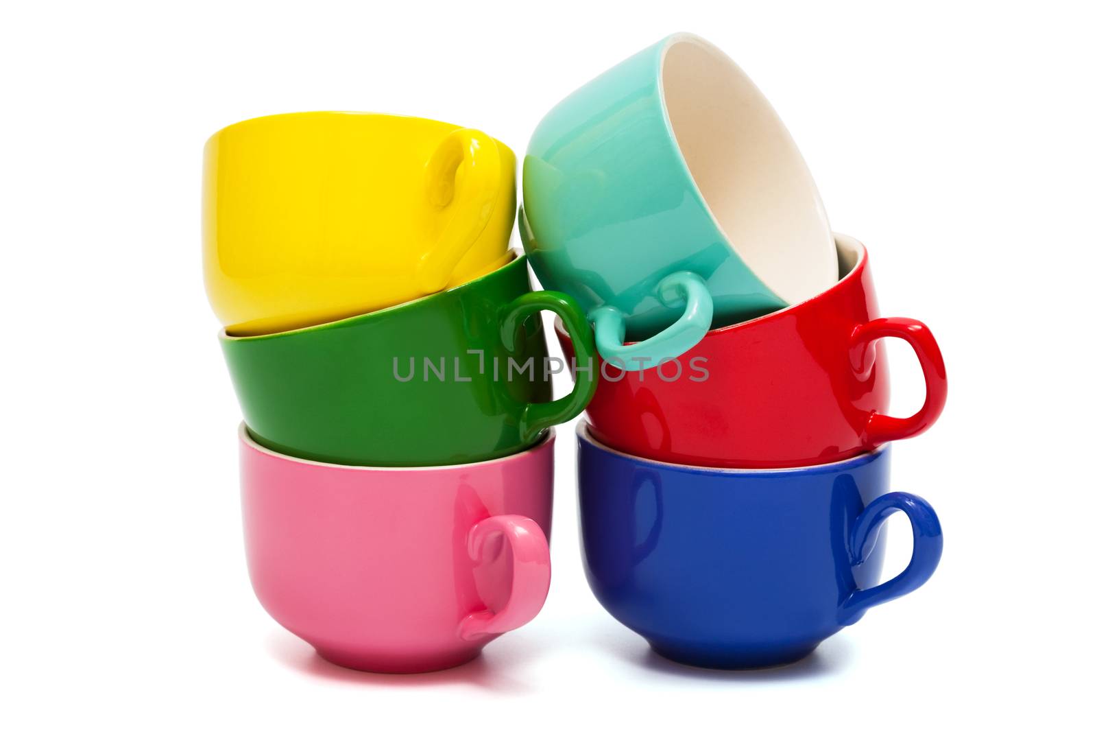 Beautiful color cups on a white background