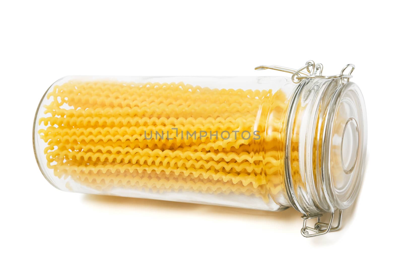 Spaghetti in glass can on a white background