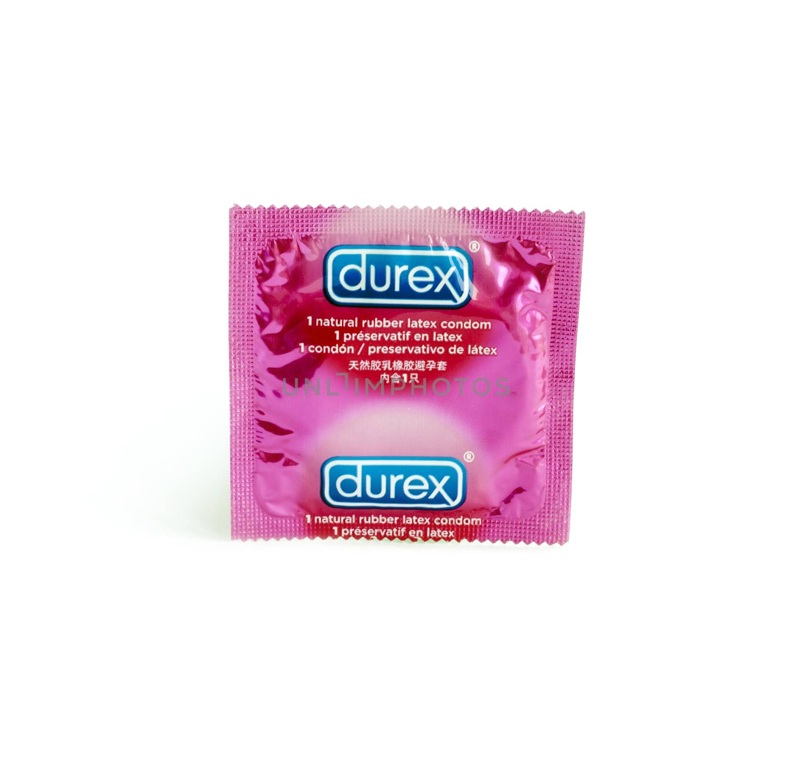 Photo of a Durex condom isolated on white by maxmitzu