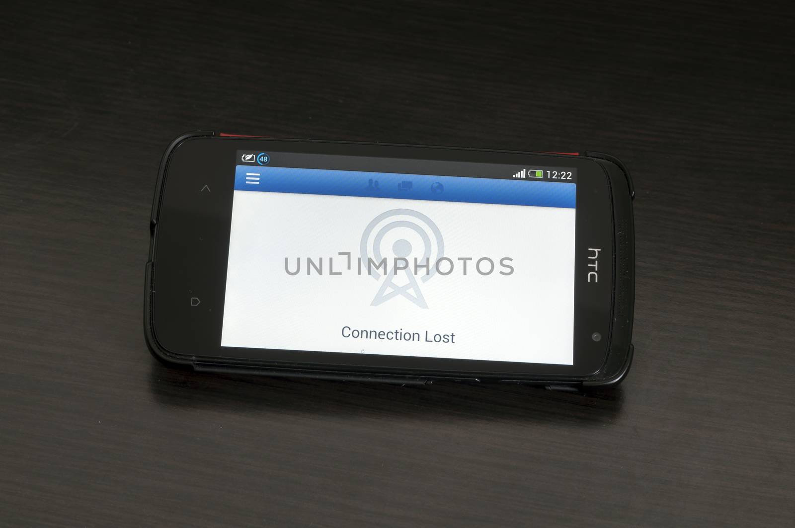Bucharest, Romania - January 28, 2014: Photo of a HTC Desire device, showing the Connection Lost logo on the Facebook app for Android devices.