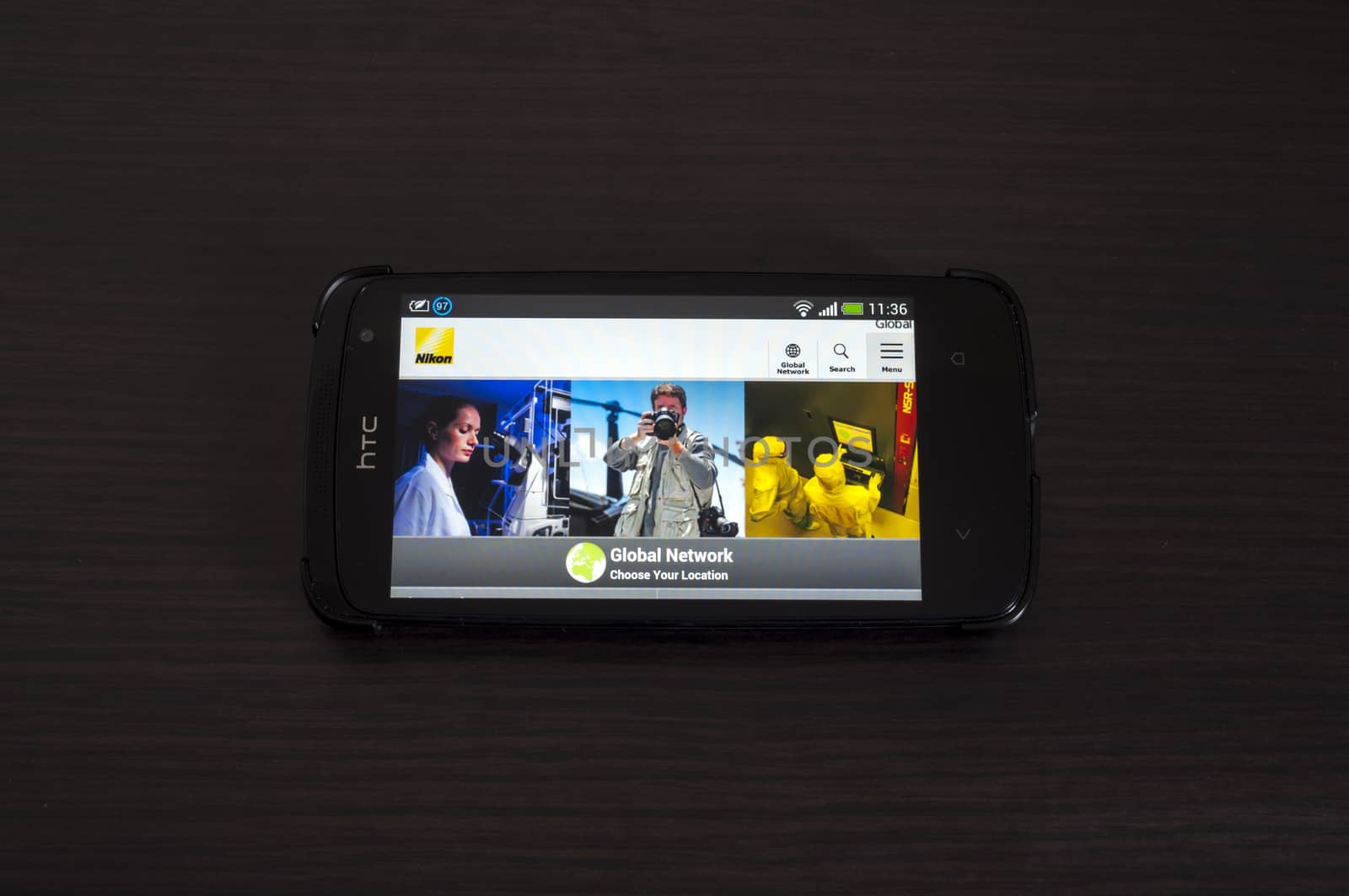Bucharest, Romania - February 05, 2014: Photo of a HTC Desire device, showing the Nikon web page. Nikon Corporation, is a Japanese multinational corporation, specializing in optics and imaging products