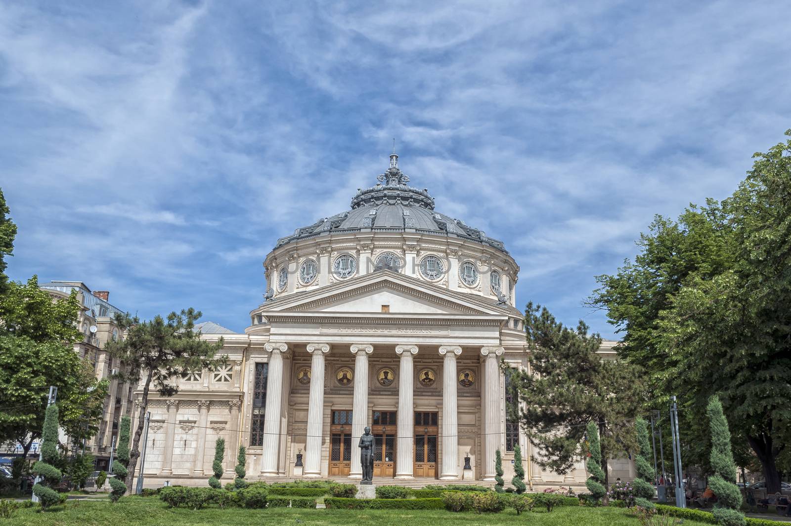 BUCHAREST, ROMANIA - MAY 09: The Romanian Athenaeum on May 09, 2013 in Bucharest, Romania. Opened in 1888 it is a concert hall in the center of Bucharest and a landmark of the Romanian capital city. by maxmitzu