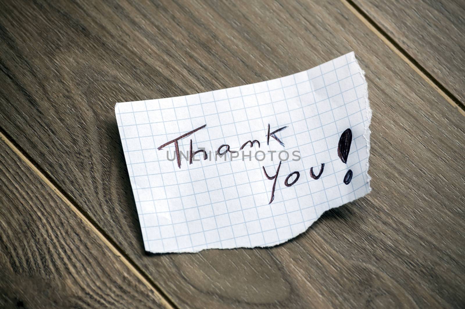 Thank you - Hand writing text on wood background