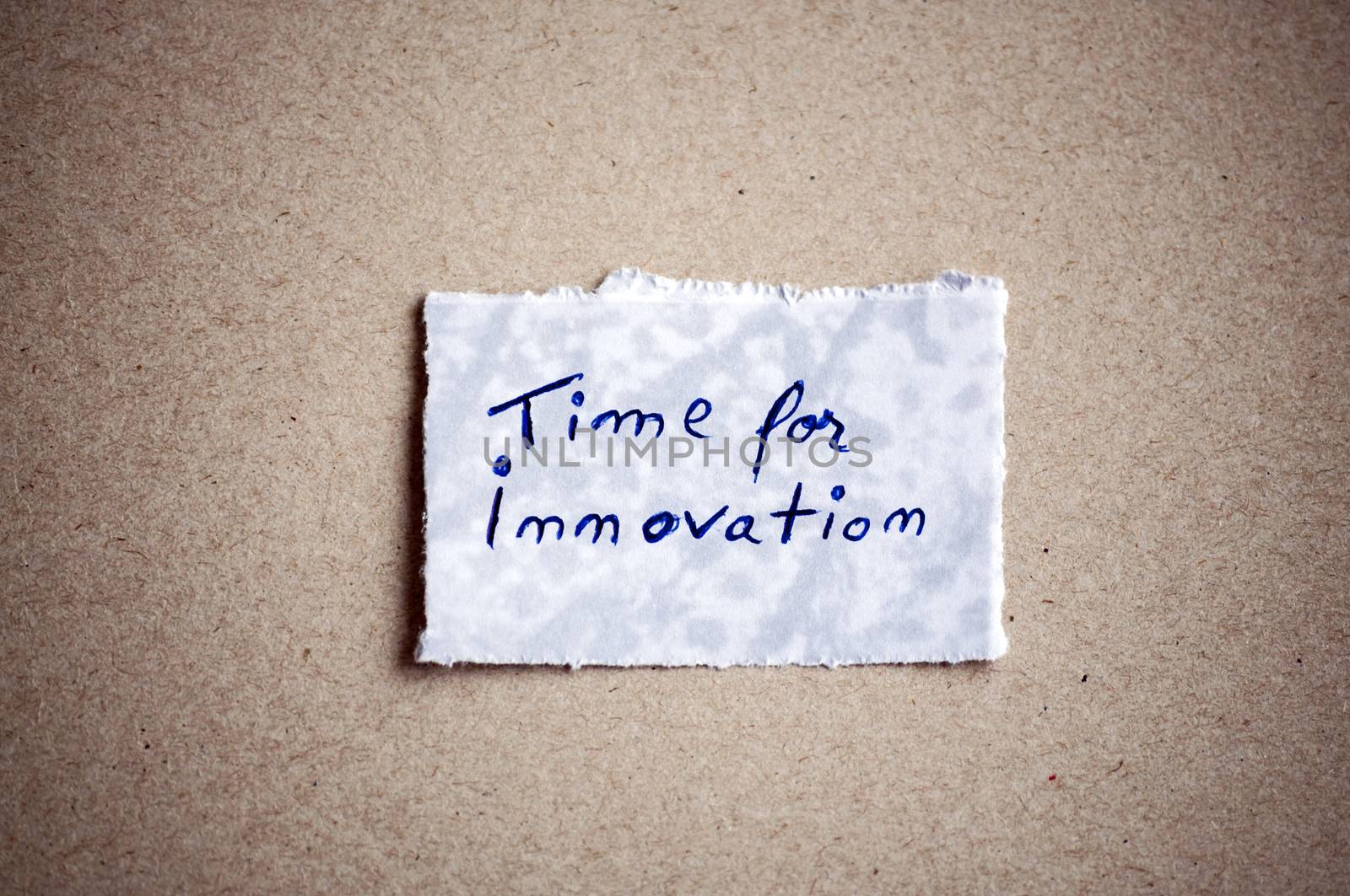 Time for innovation message,written on piece of paper, on cardboard background. Space for your text.