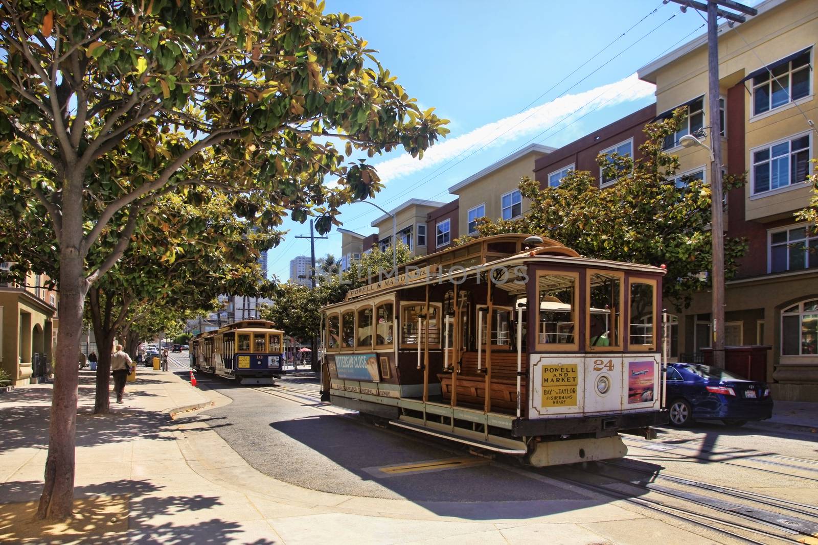 SAN FRANCISCO, CA - AUGUST 17: Passengers ride in a cable car on August 17, 2013 in San Francisco. It is the most popular way to get around the City of San Fransisco which is in service since 1873.