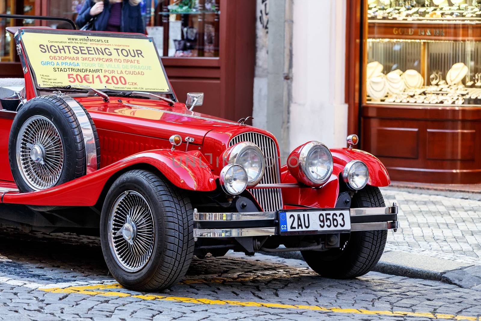 PRAGUE, CZECH REPUBLIC - MARCH 13th, 2014 - Famous historic red car Praga in Prague street. Praga is a manufacturing company founded in 1907 based in Prague, Czech Republic.