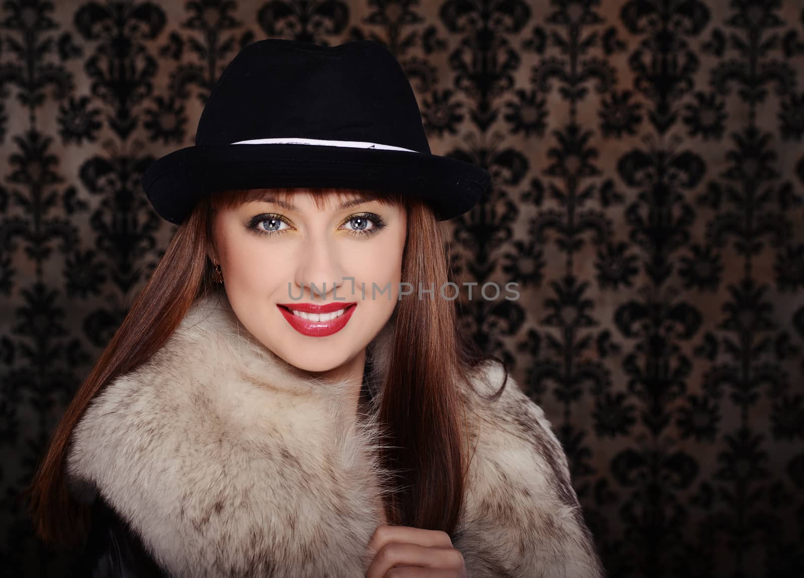 Beautiful woman in retro style over dark vintage background