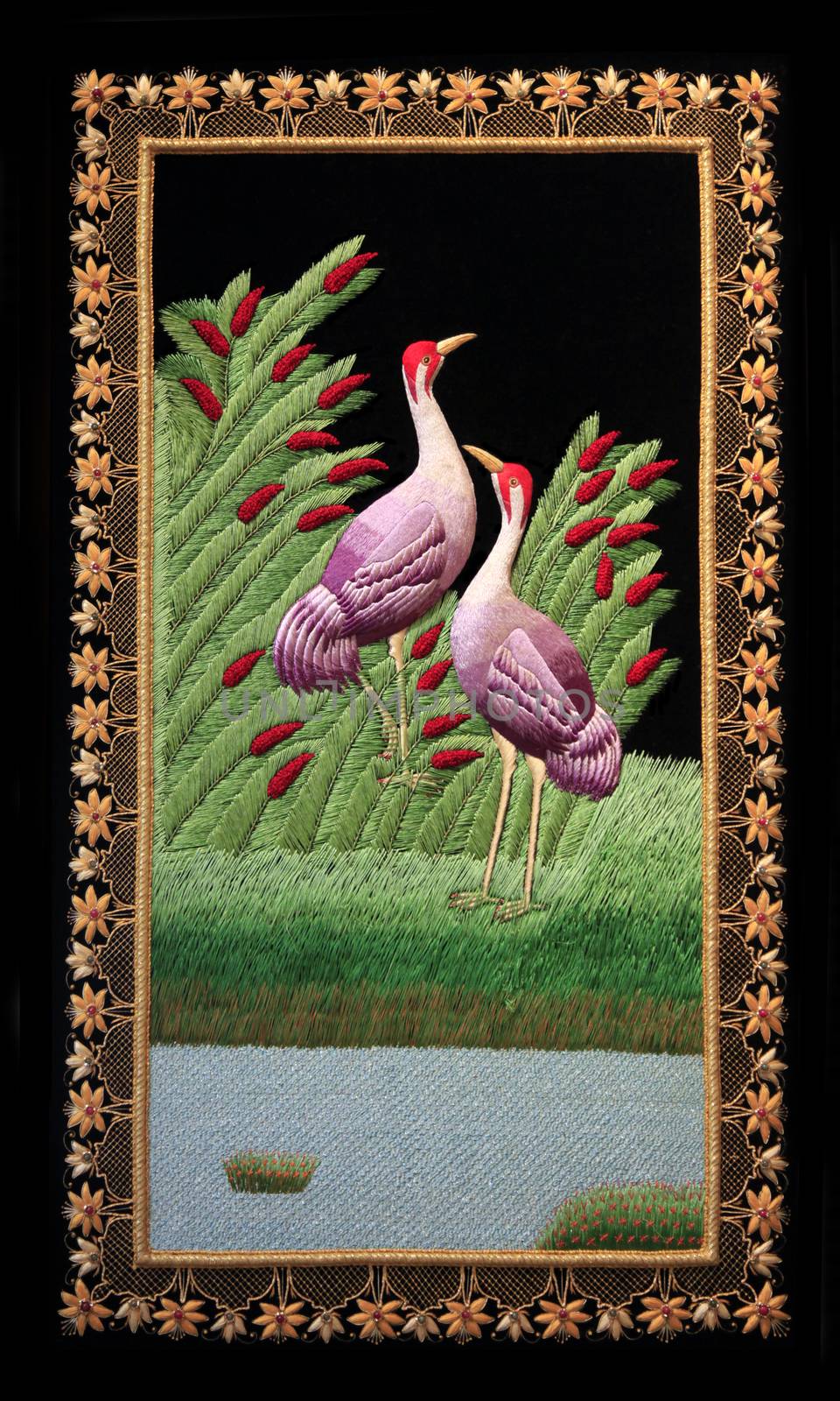 Background with embroidered two birds. Mauritius