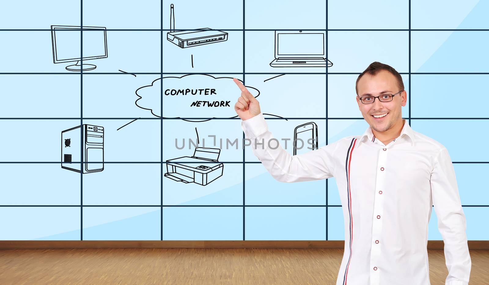 happy man pointing at plasma wall with computer network