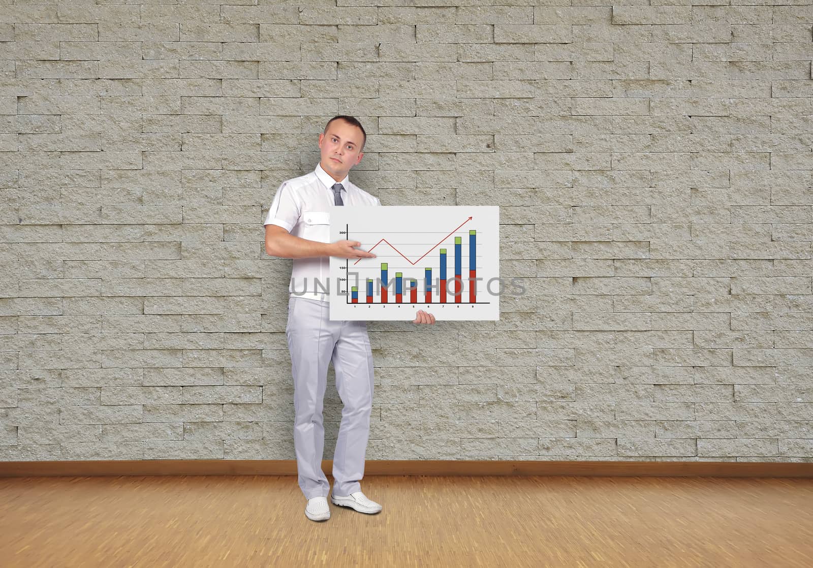 businessman holding placard with business chart