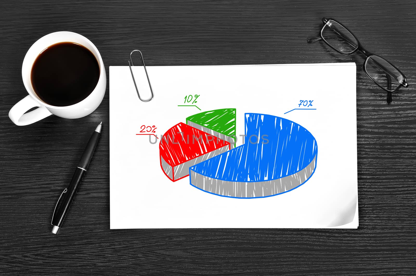 paper with chart on table in office