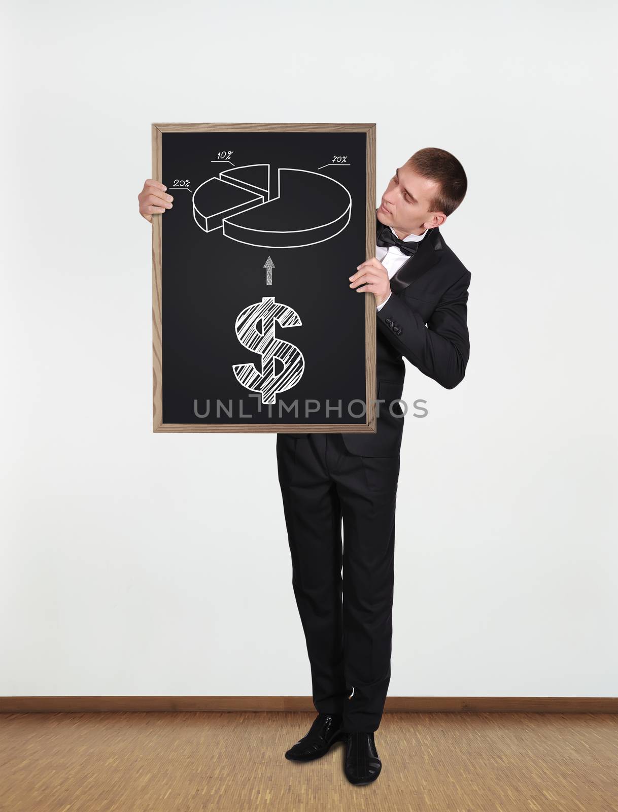 businessman standing in office and  holding blackboard with business concept