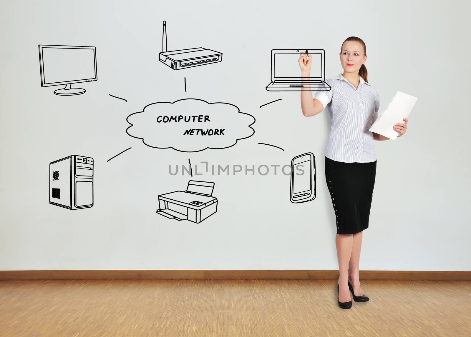 businesswoman standing  in office drawing computer network