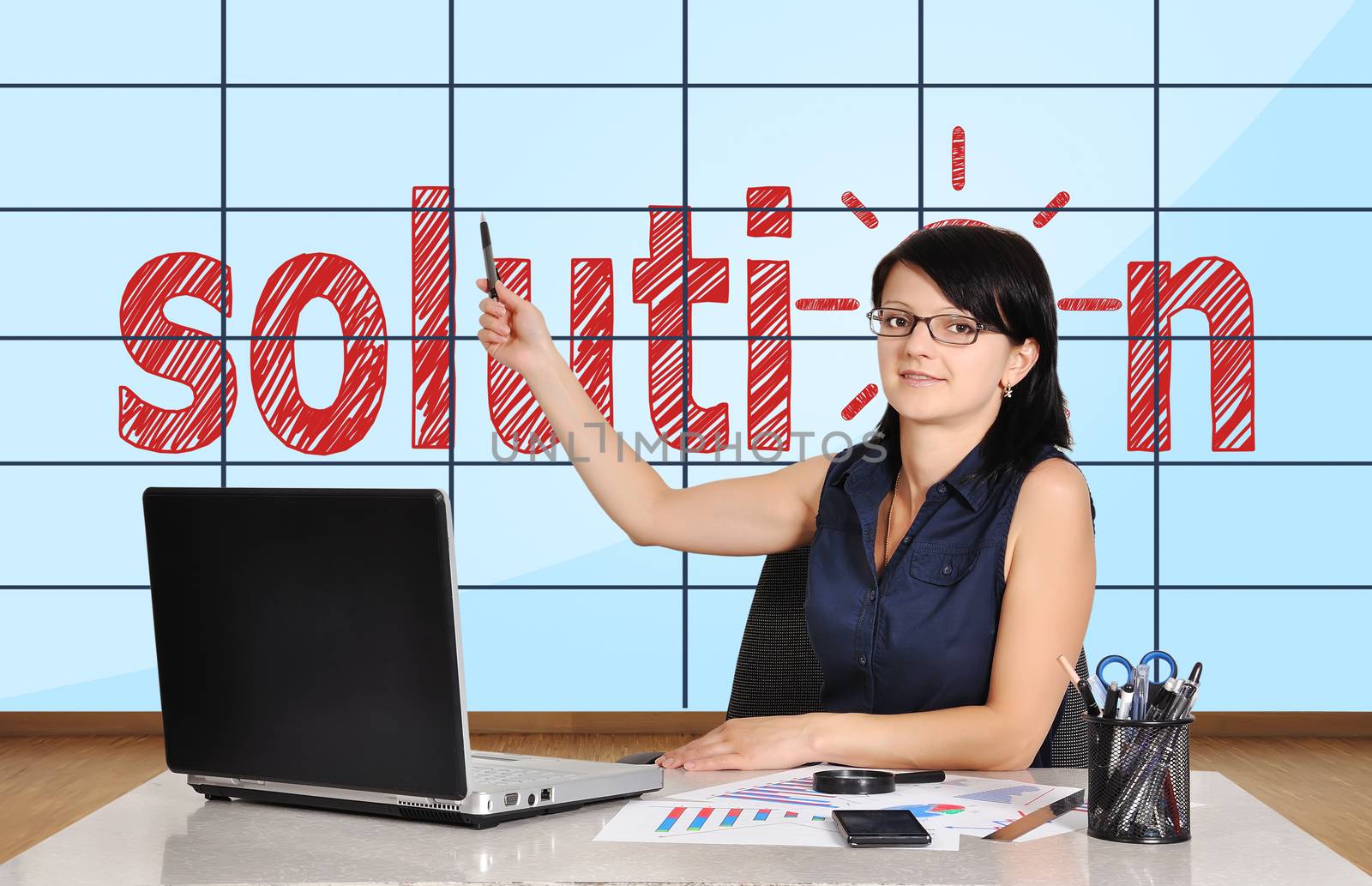 woman in office pointing at plasma panel with solution