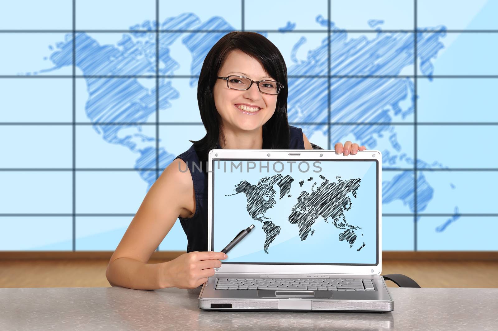 woman sitting in office and laptop, travel concept