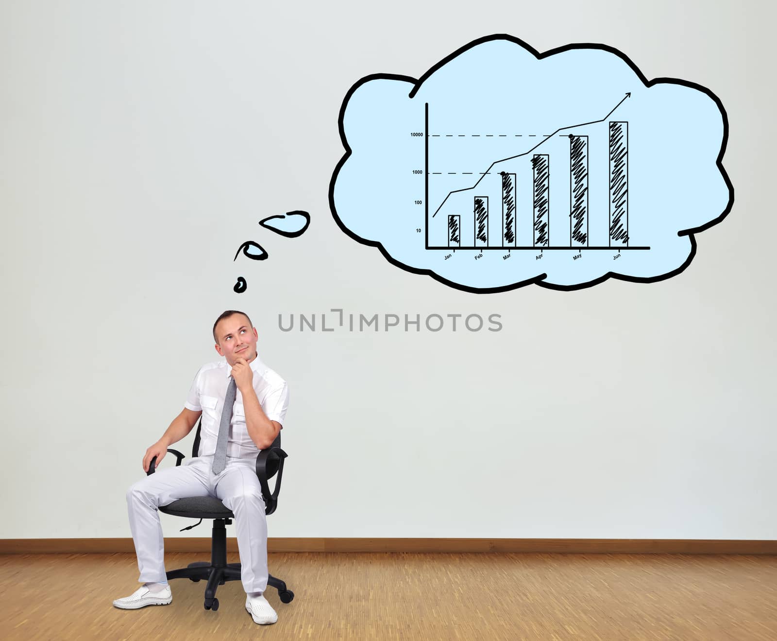 man sitting on chair and thinking about chart