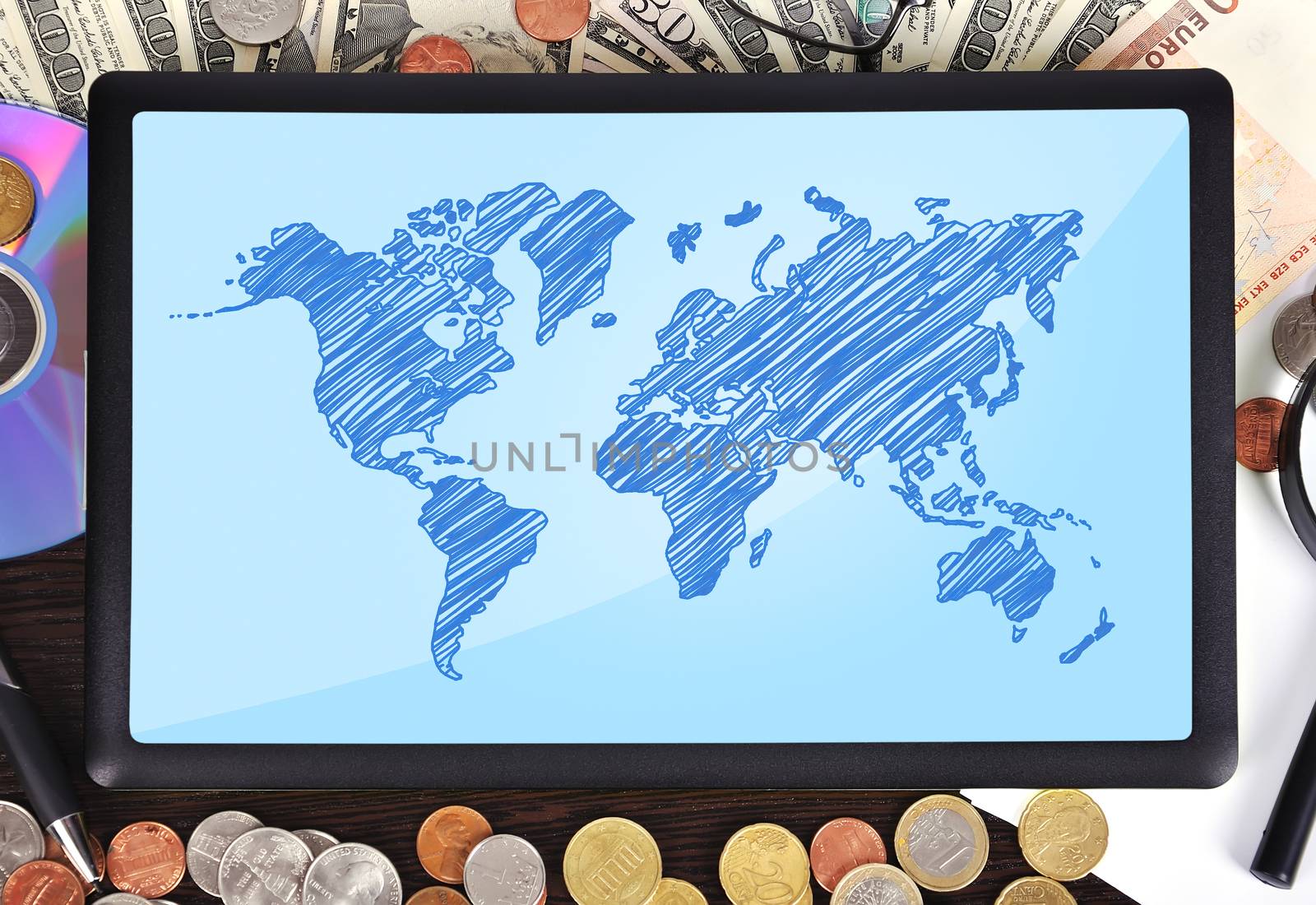 Modern business workplace: tablet with world map