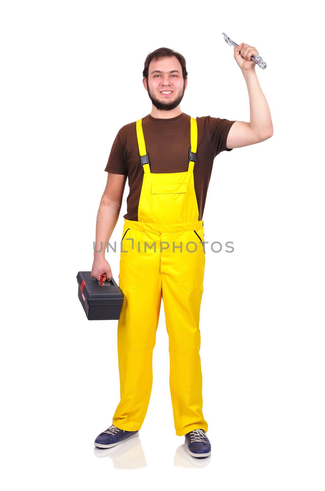 builder holding wrench and box on a white background