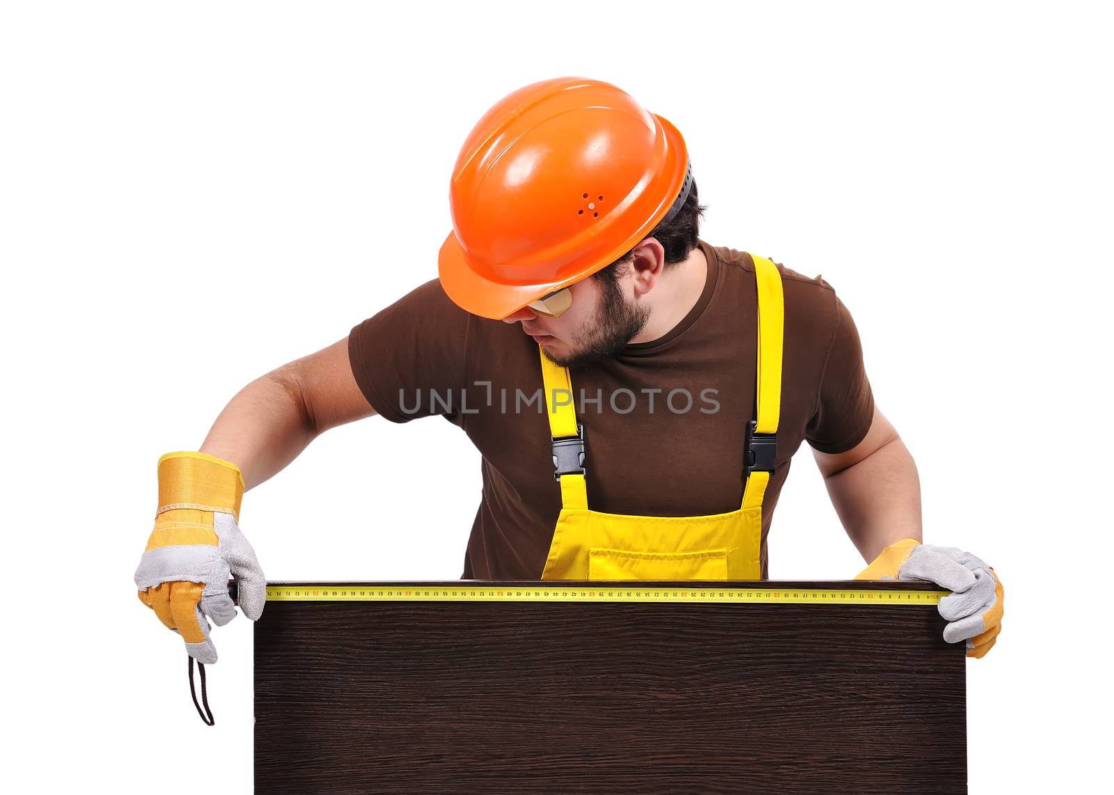 builder with yellow tape measure on a white background