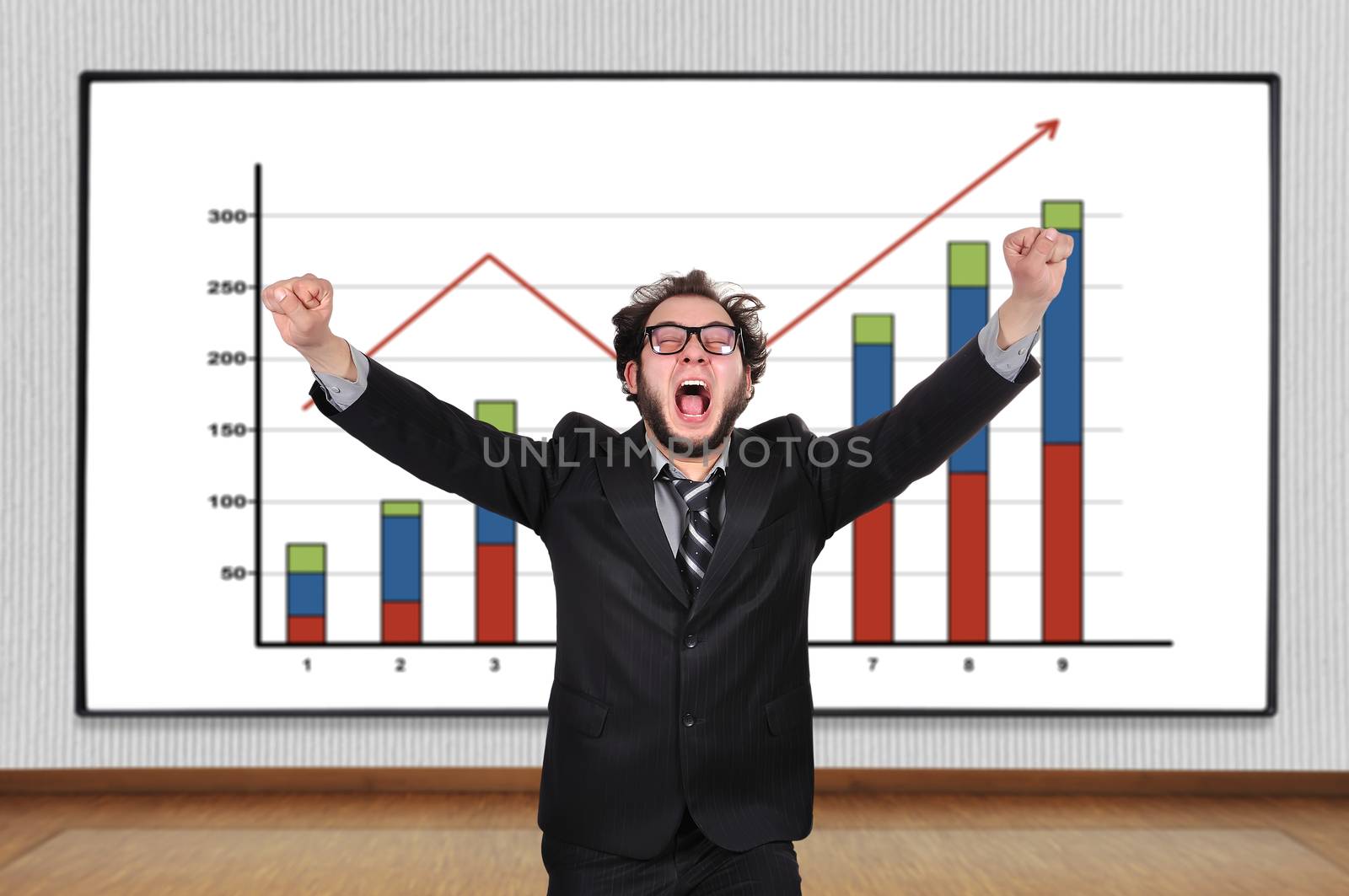 crazy  businessman and blackboard with chart