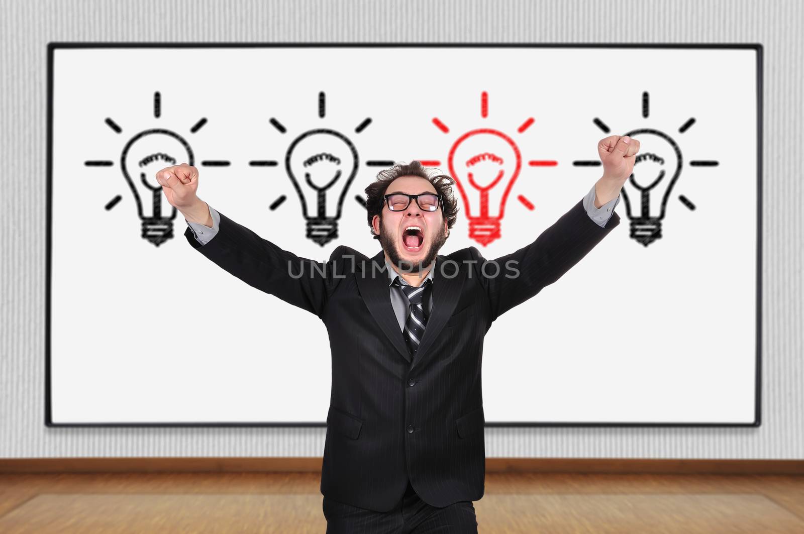 crazy  businessman and blackboard with four lamps