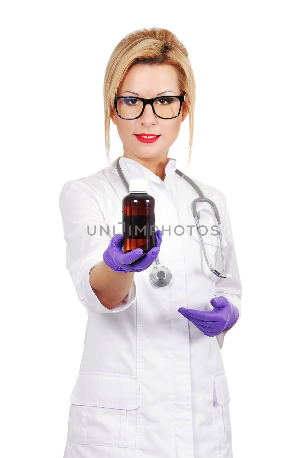 young female doctor holding medicament in hand