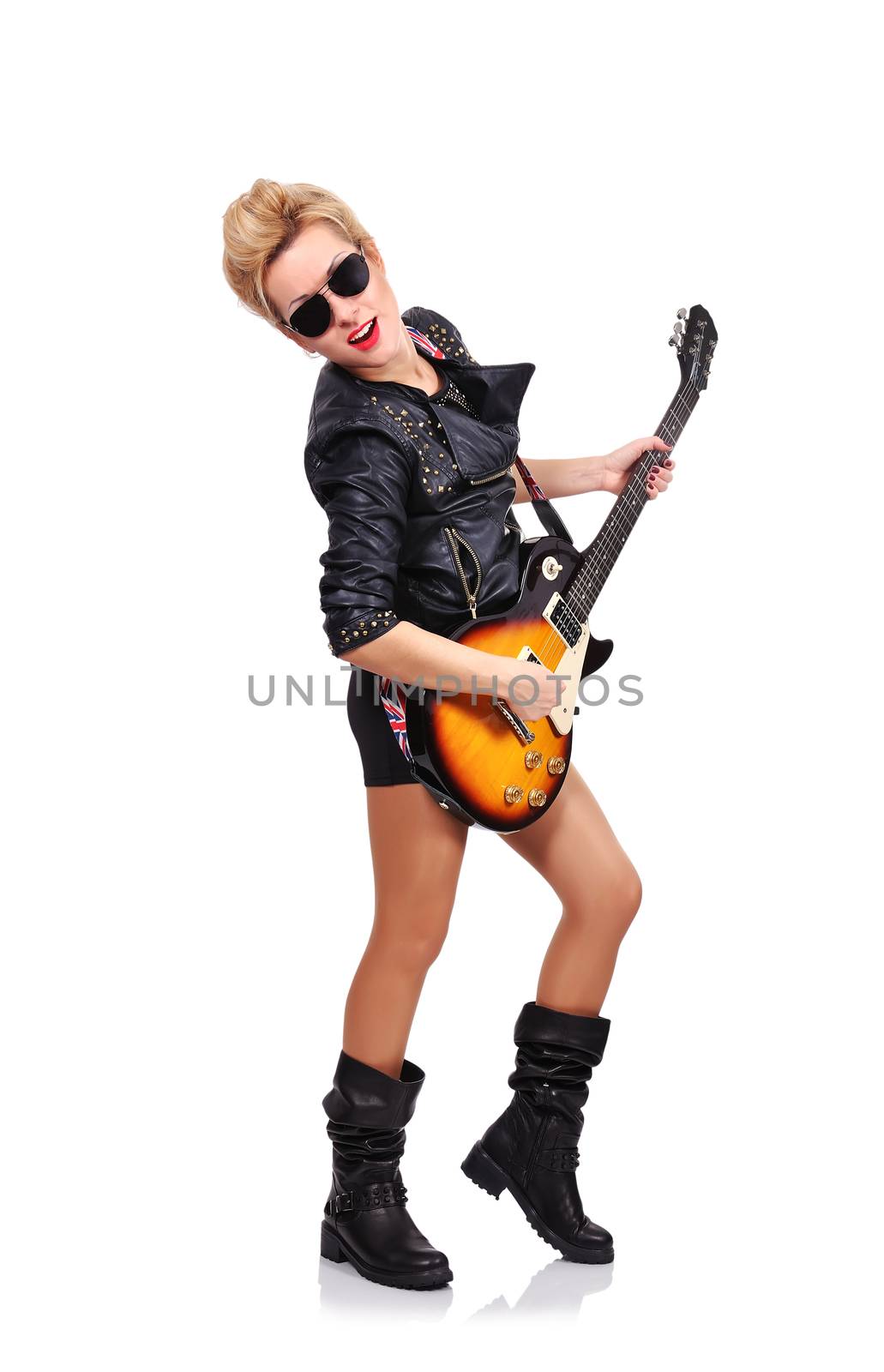 young rock girl playing on electric guitar