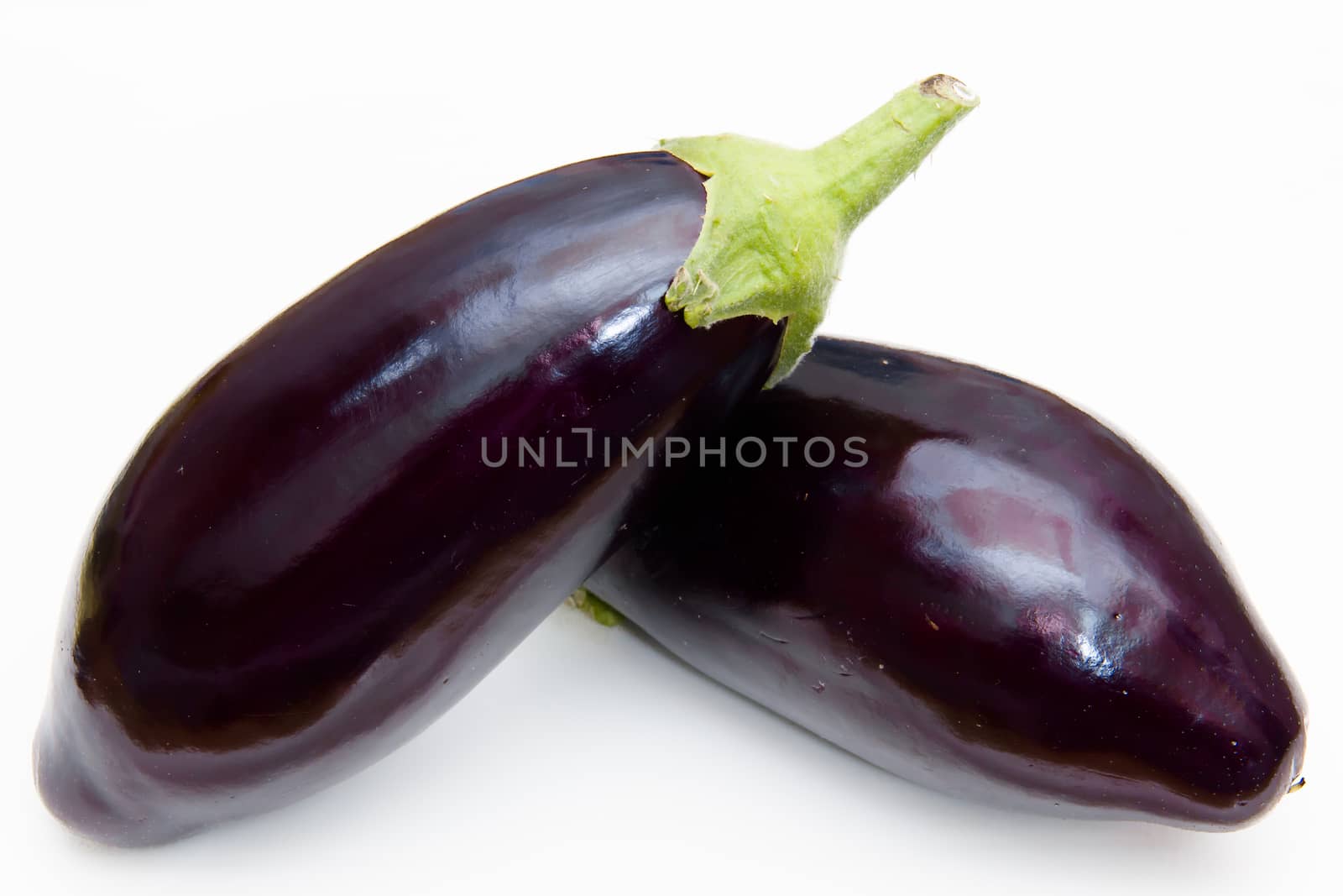 Fresh eggplant on a white background