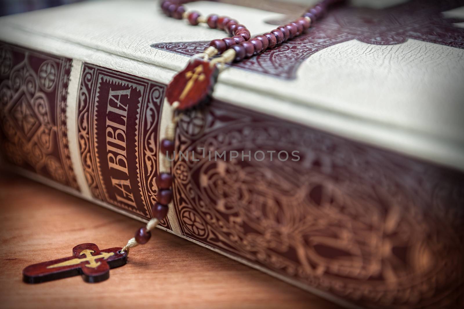 Rosary beads and a holy bible