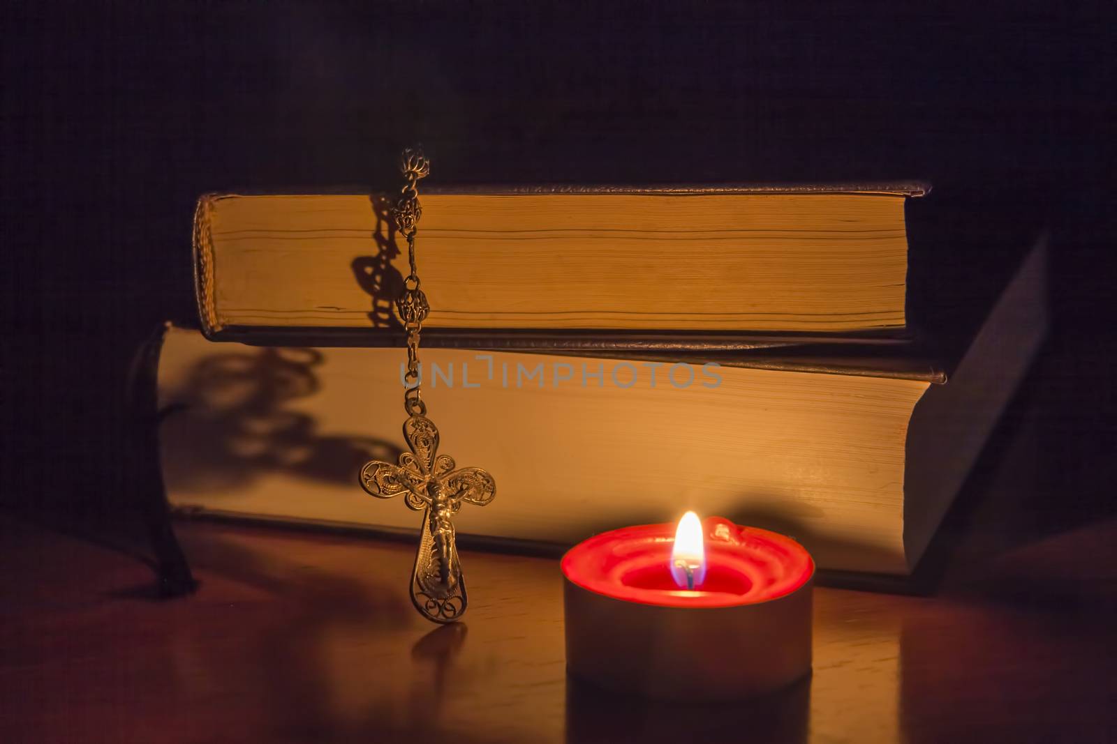 Rosary beads and a holy bible by digicomphoto