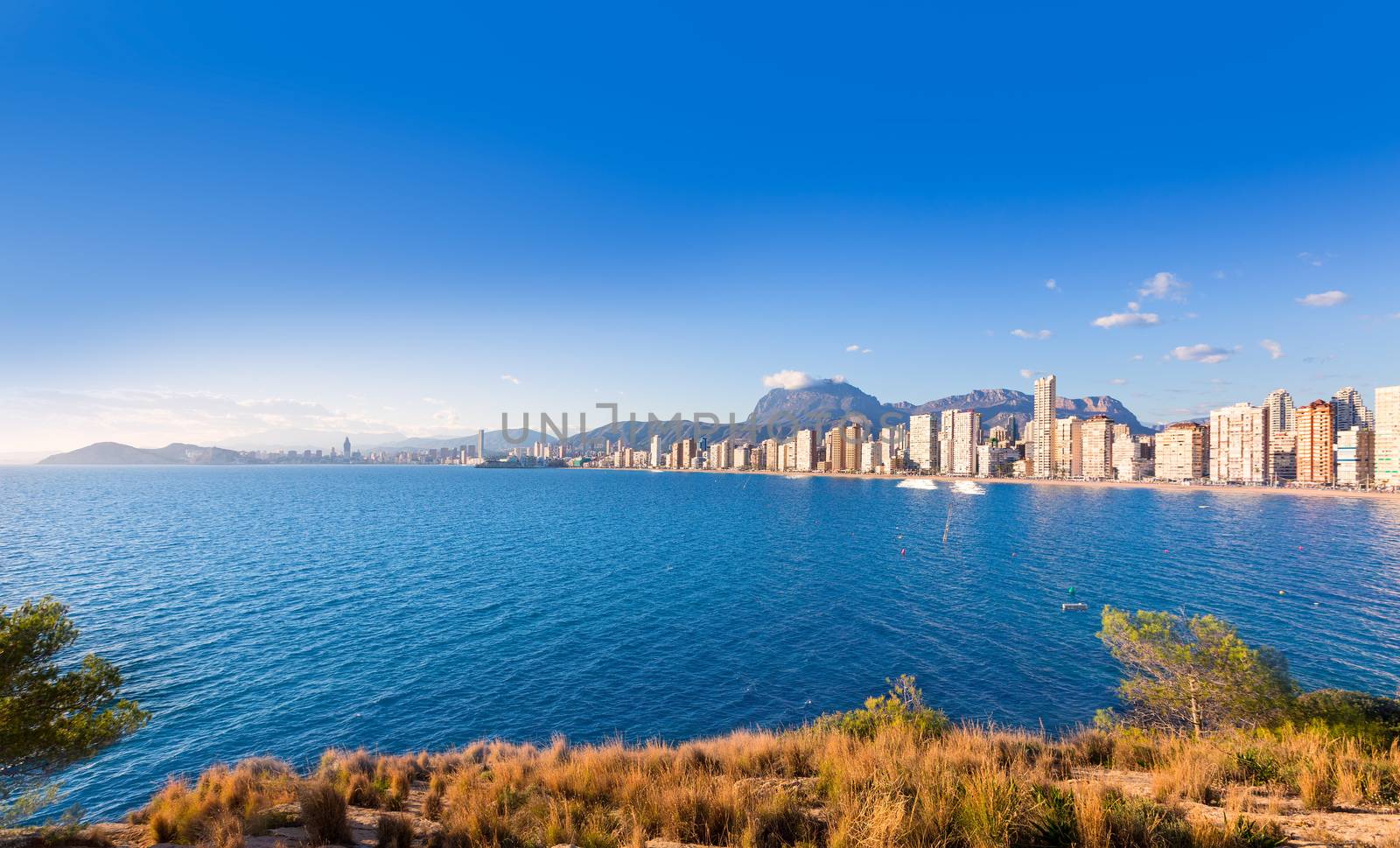 Benidorm skyline Levante beach in blue Mediterranean sea by lunamarina