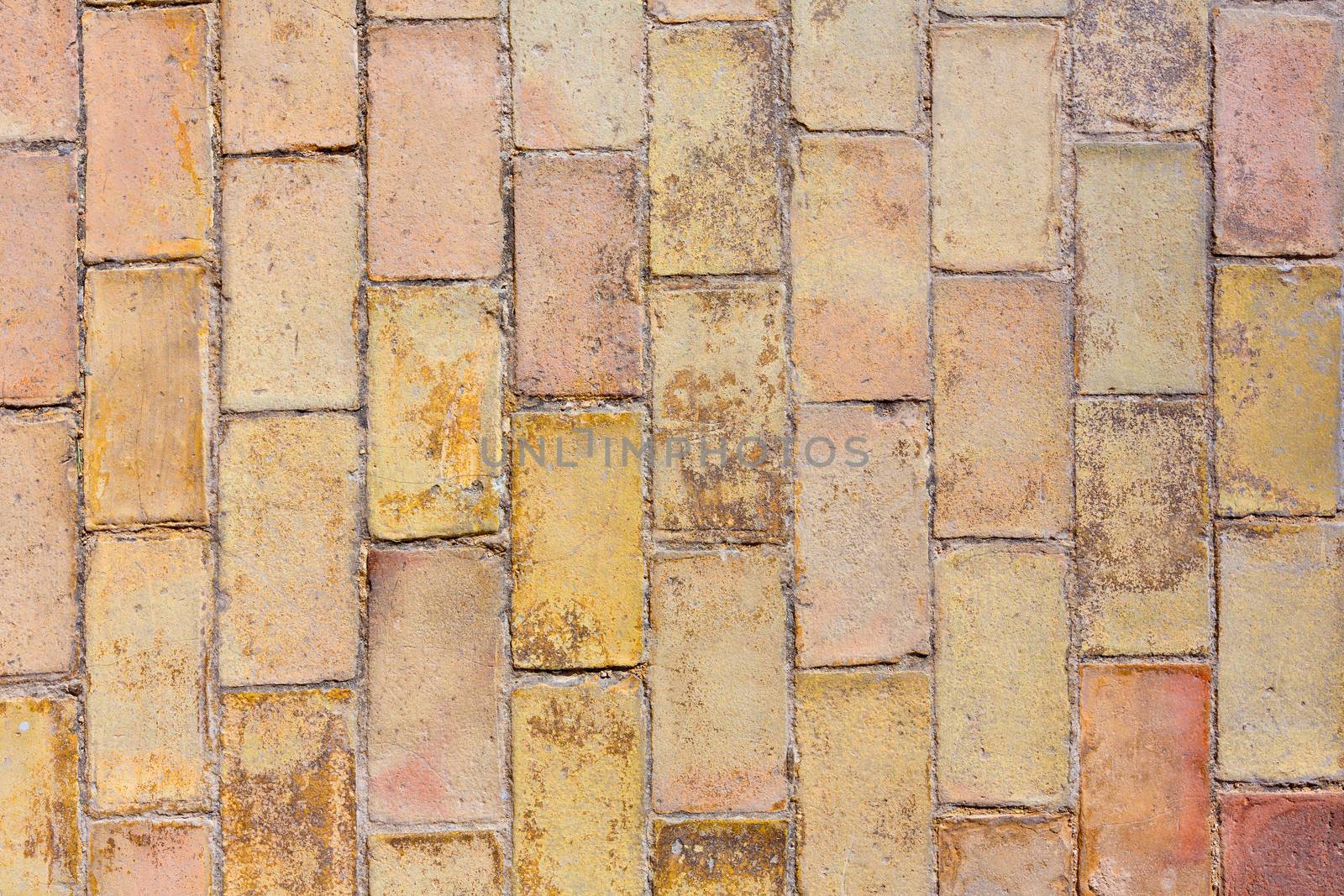 Clay ancient brick flooring texture in Alicante castle of Spain
