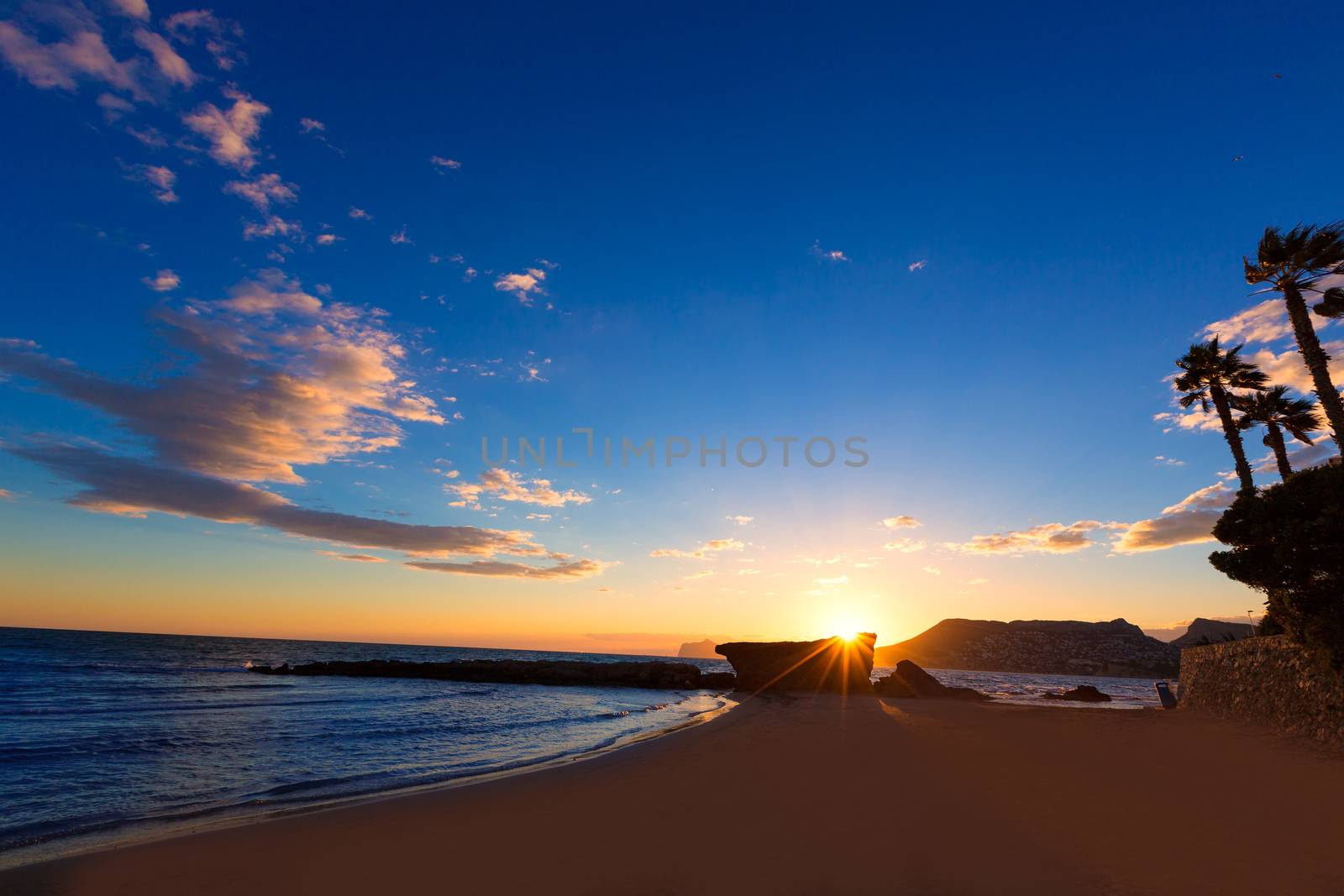 Calpe Alicante sunset at beach Cantal Roig in Spain by lunamarina