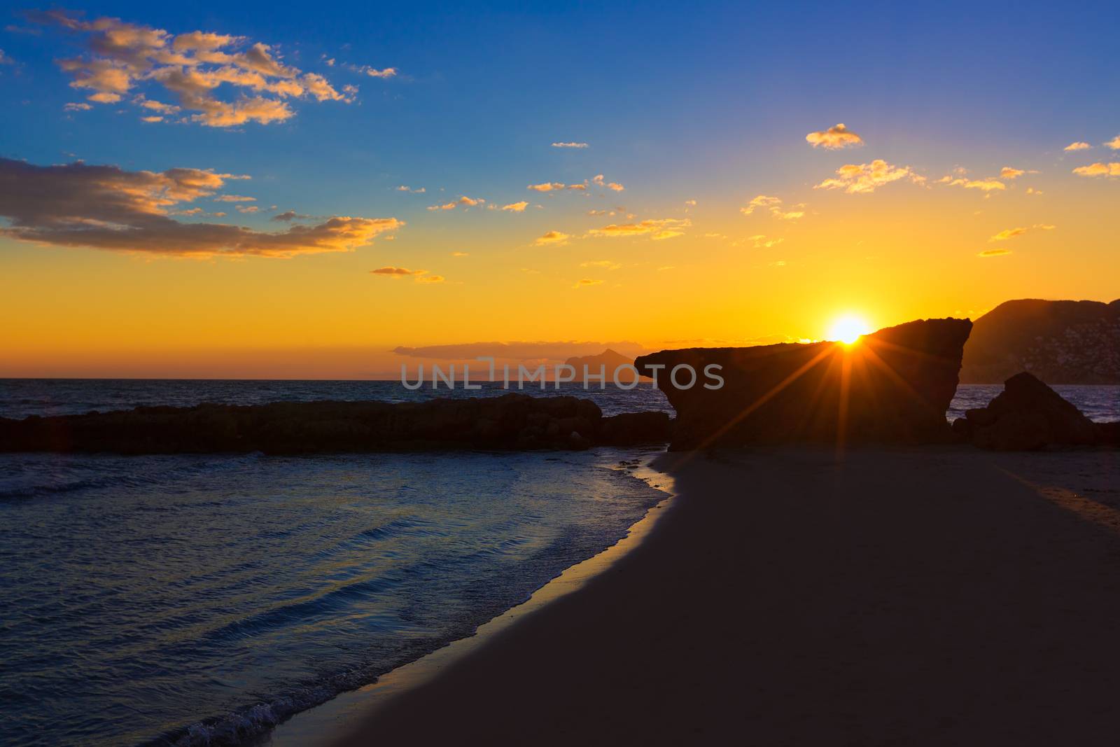 Calpe Alicante sunset at beach Cantal Roig in Mediterranean Spain