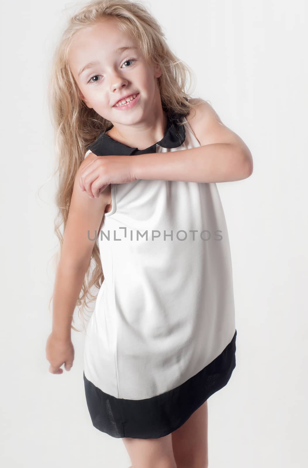 Little girl in white dress by anytka