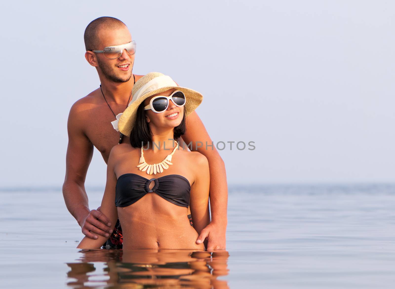 Happy couple in sea 