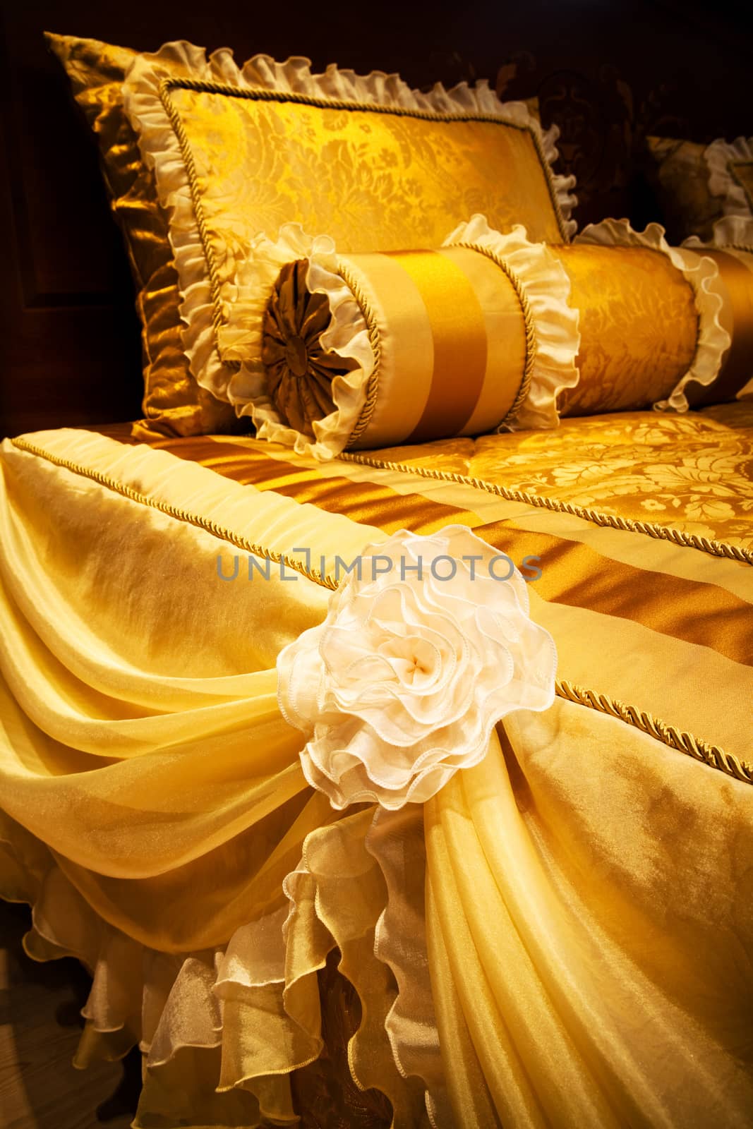 beautiful yellow pillows on the beds of modern