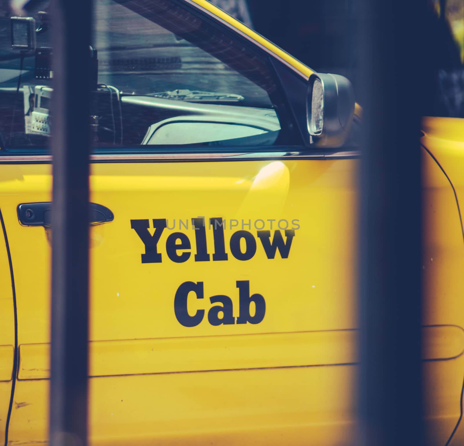 Retro Vintage Style Photo Of Busy Urban Scene Of A Yellow Cab Detail