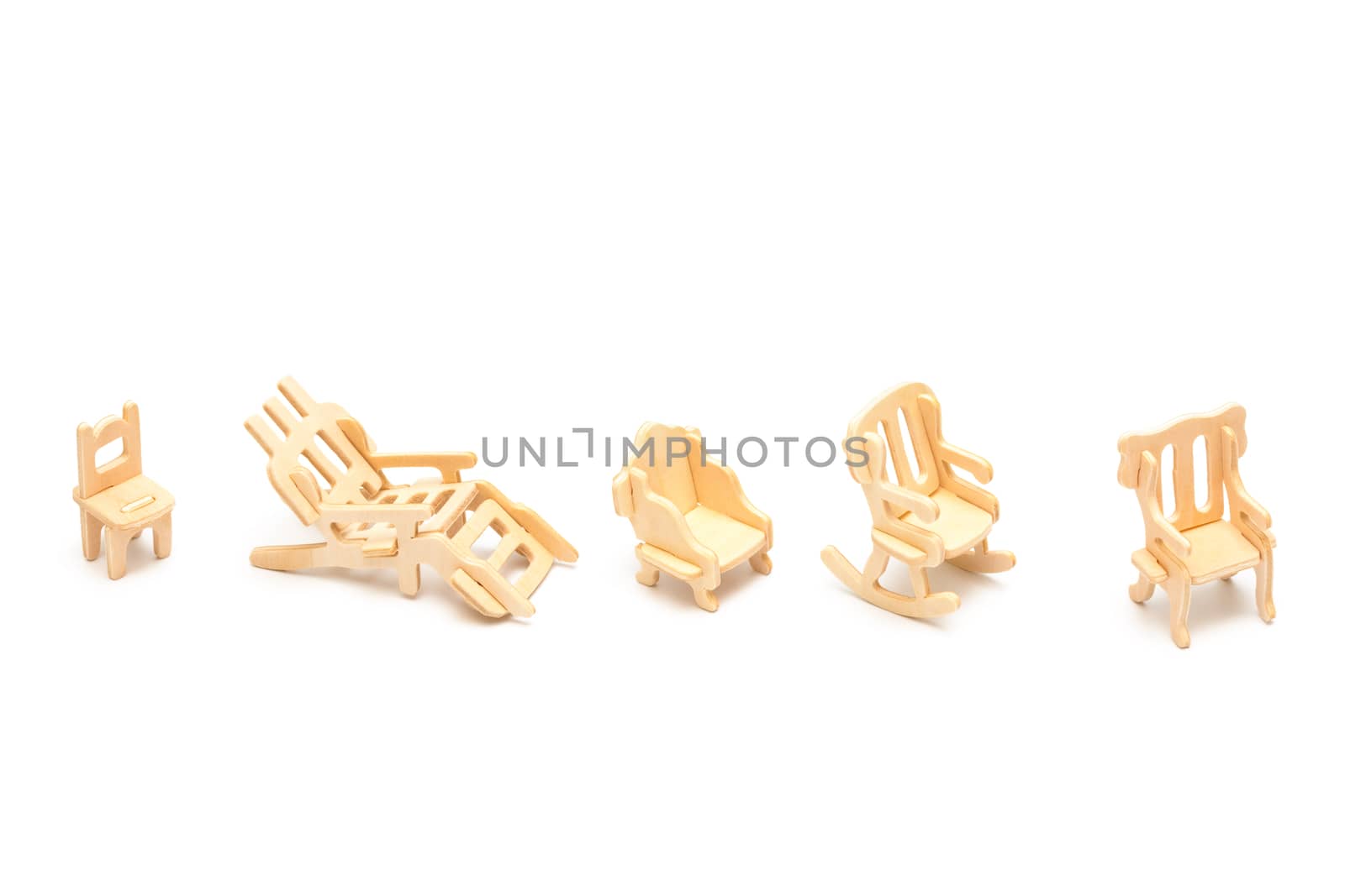 wooden toy furniture on a white background