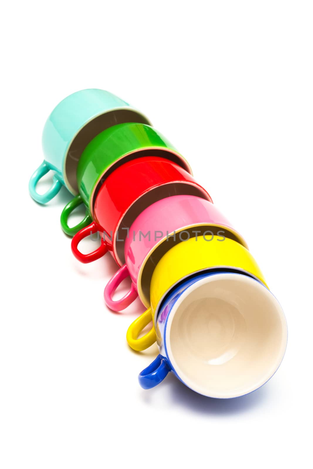 Beautiful color cups on a white background