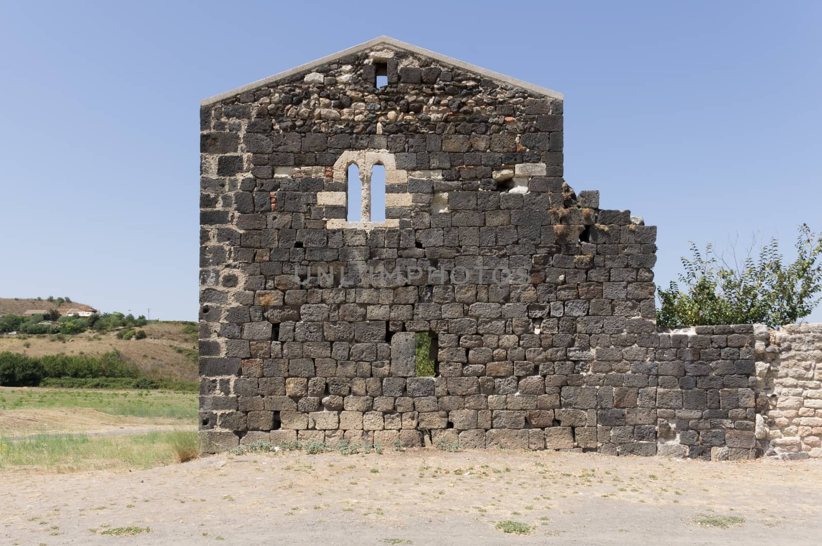 double lancet window in a stone wall.