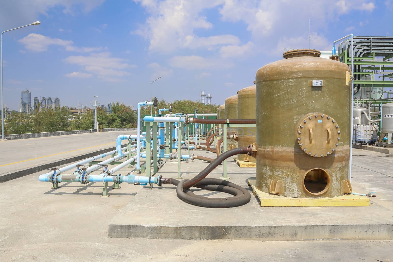 Chemical tank storage with PVC pipe line in factory