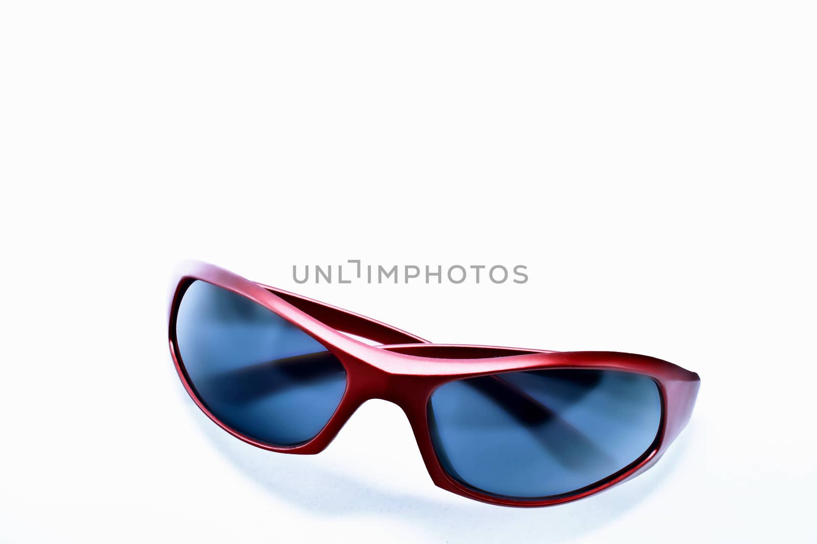 Sleek red plastic sunglasses with dark non reflective lens. 