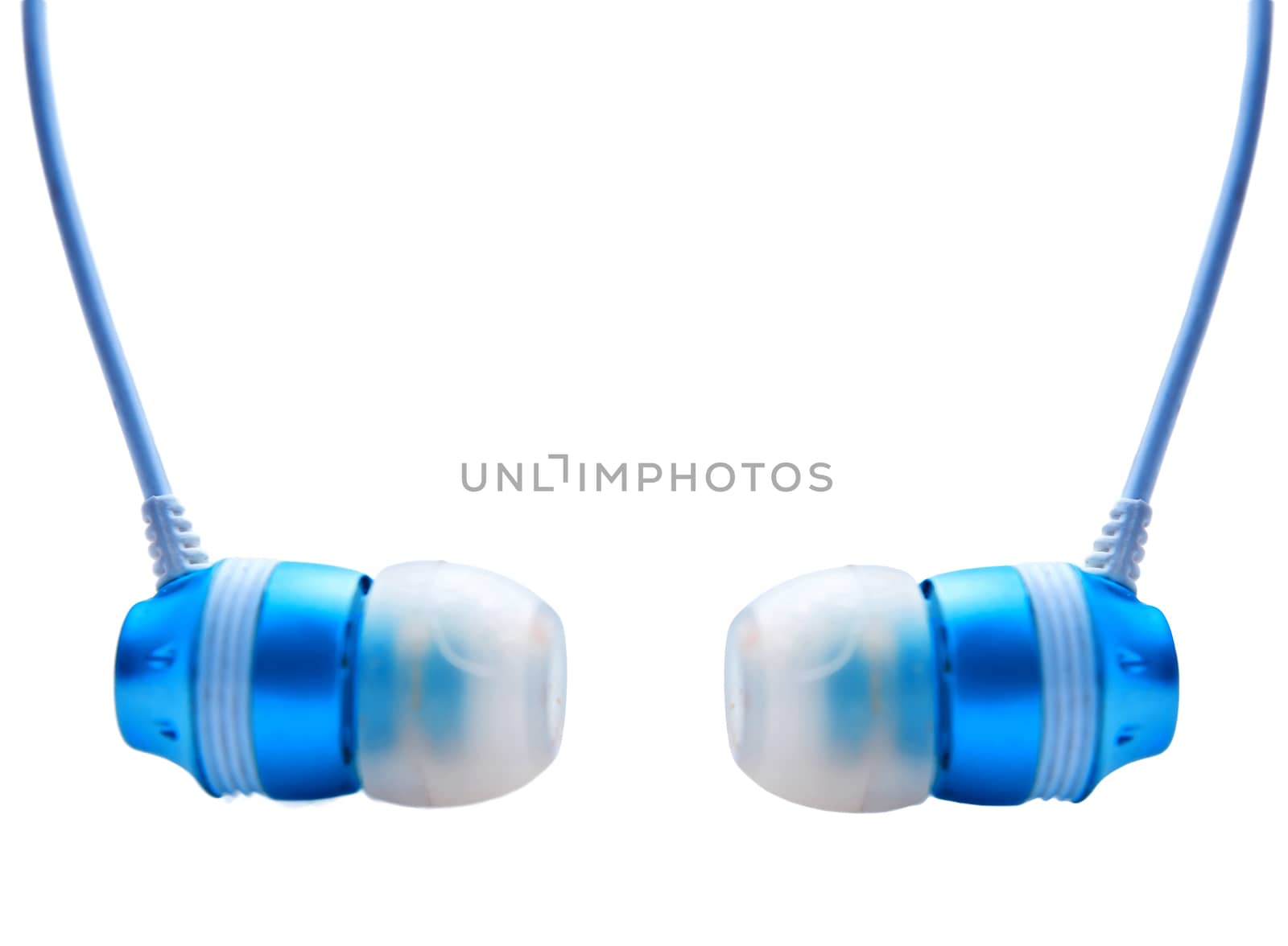 Blue ear bud headphones, symmetrical. Room for text.