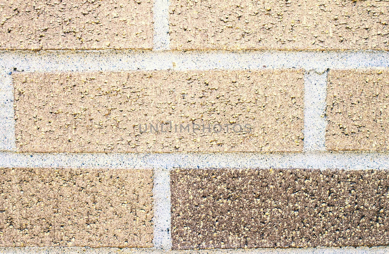 Closeup of brick wall with great detail of the rough texture and pattern.