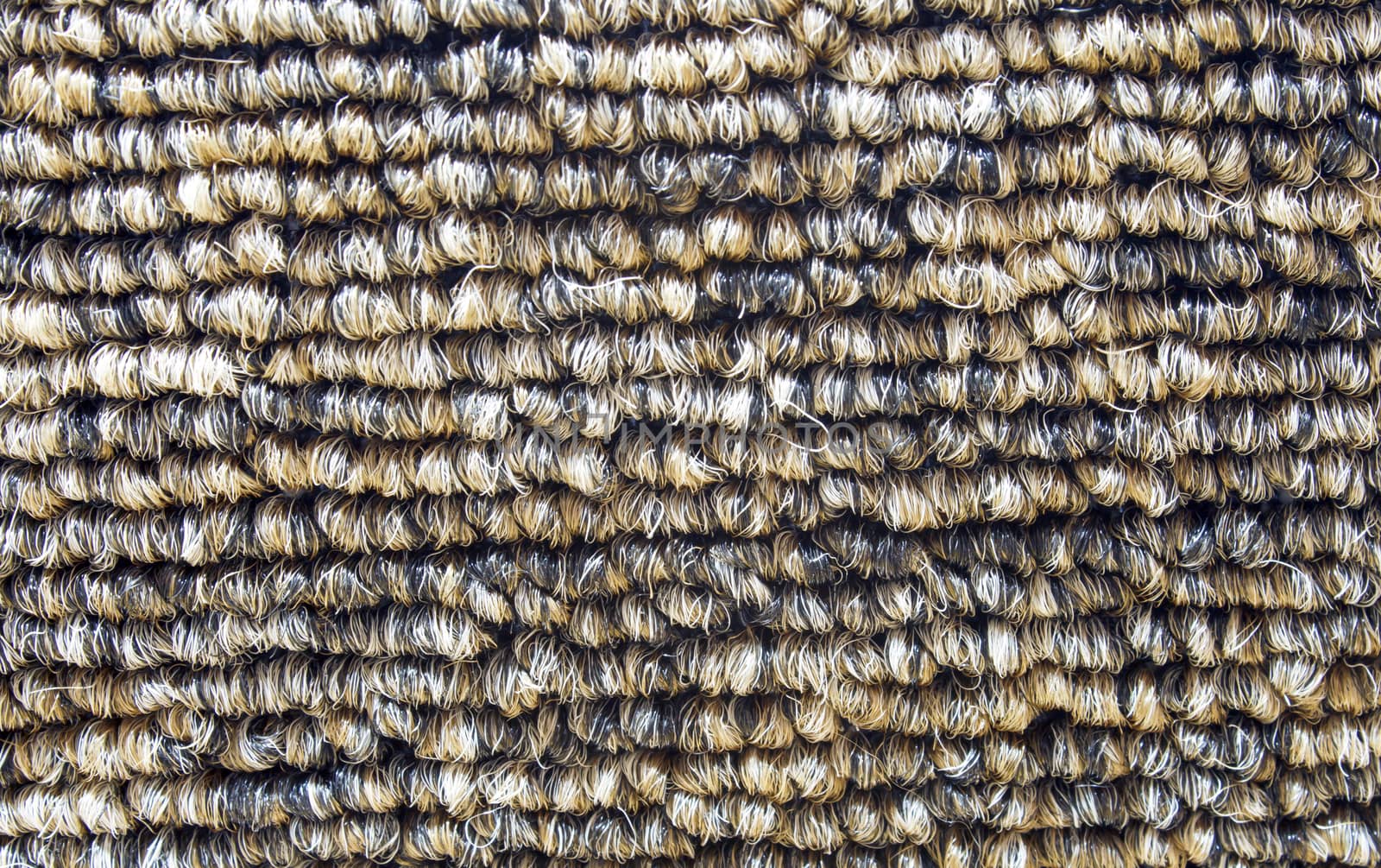 Detailed shot of natural colored industrial carpet.