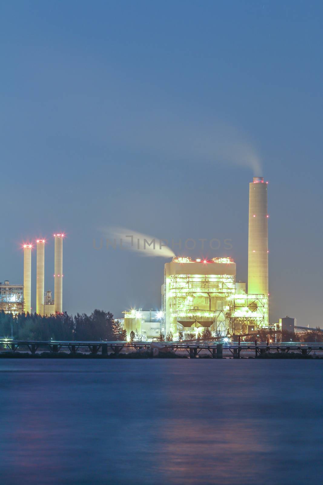 Power plant with bay on night time