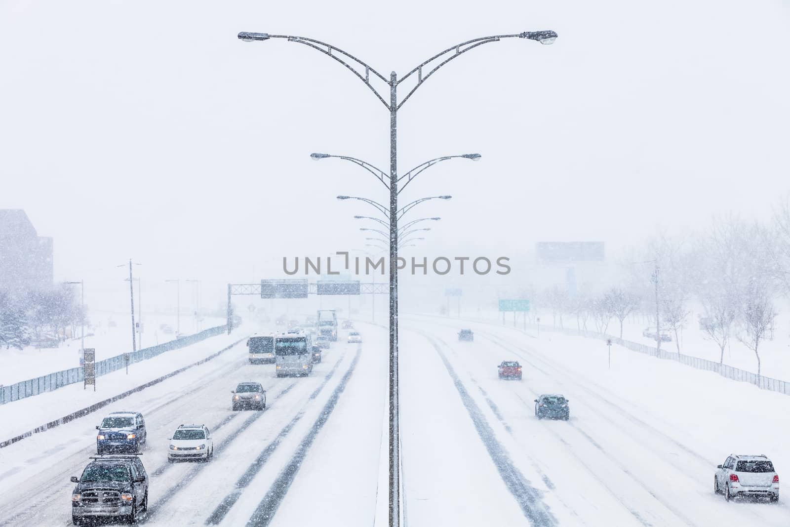 Symmetrical Photo of the Highway Center during a Snowstorm