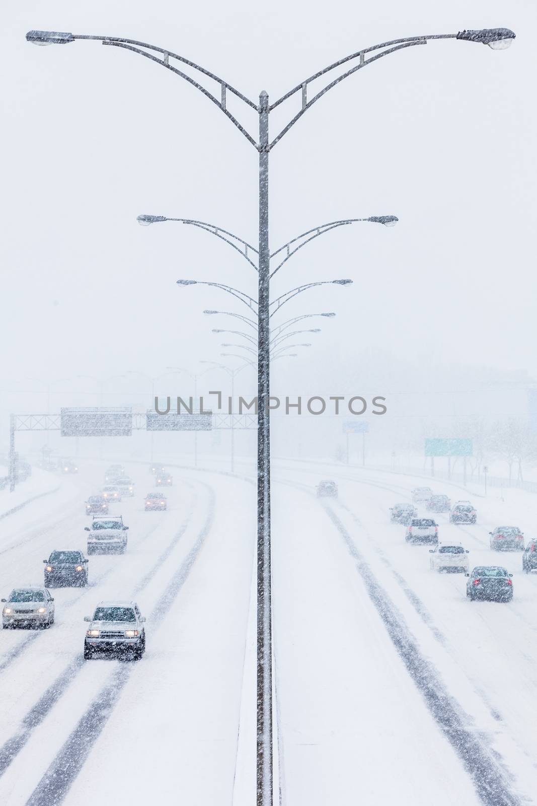 Symmetrical Photo of the Highway Center during a Snowstorm